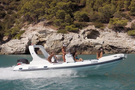 Pholas 23 rhib at sea with customers enjoying a private boat rental in Comino.